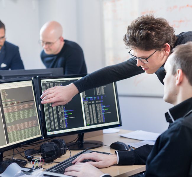 photo of men coding